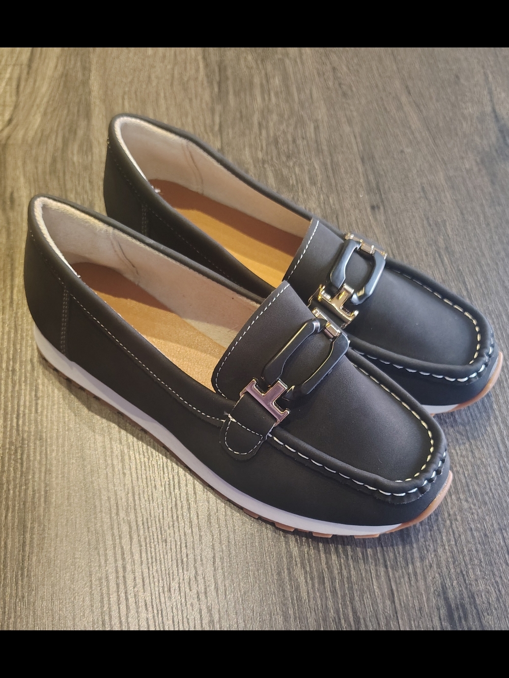 Classic Black Slip-On Loafers with Metal Accent